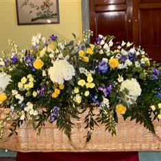 Blue and Yellow Garden Casket Spray 